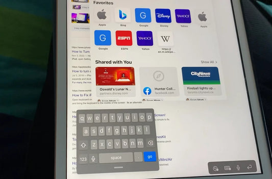 How to fix iPad keyboard floating in middle of screen